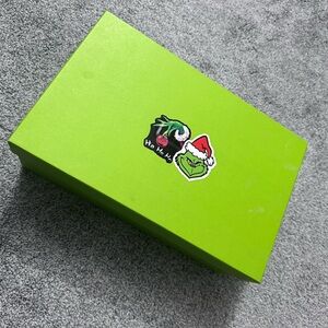 Grinch shoe box with pair of extra green laces